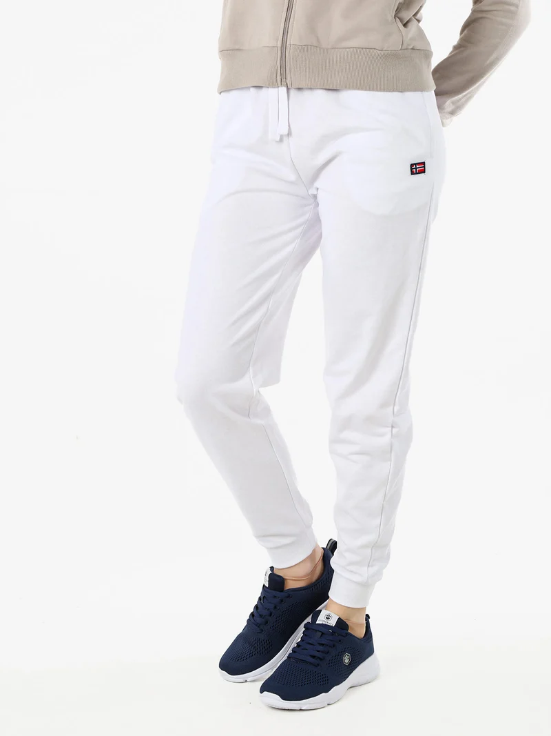 Pantaloni tuta da donna in cotone con coulisse e polsini - bianco
