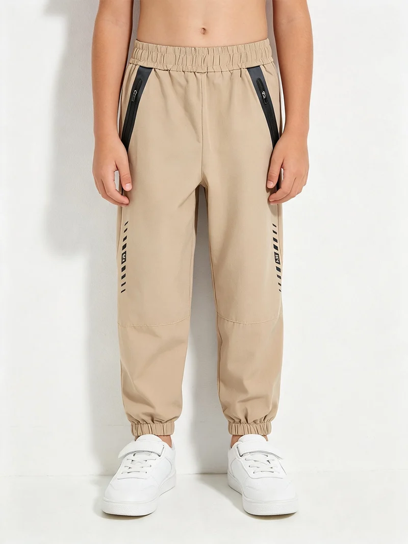 Pantaloni da bambino leggeri con elastico sul finale - khaki
