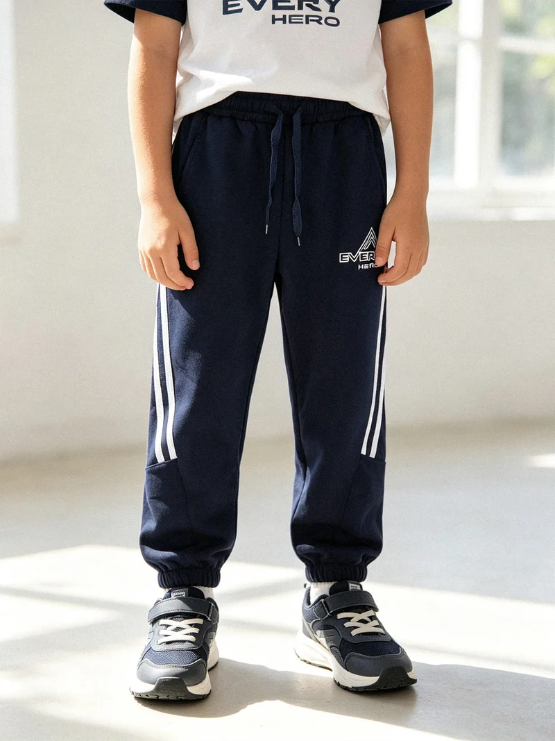 Pantaloni sportivi da bambino con elastico sul finale - blu scuro