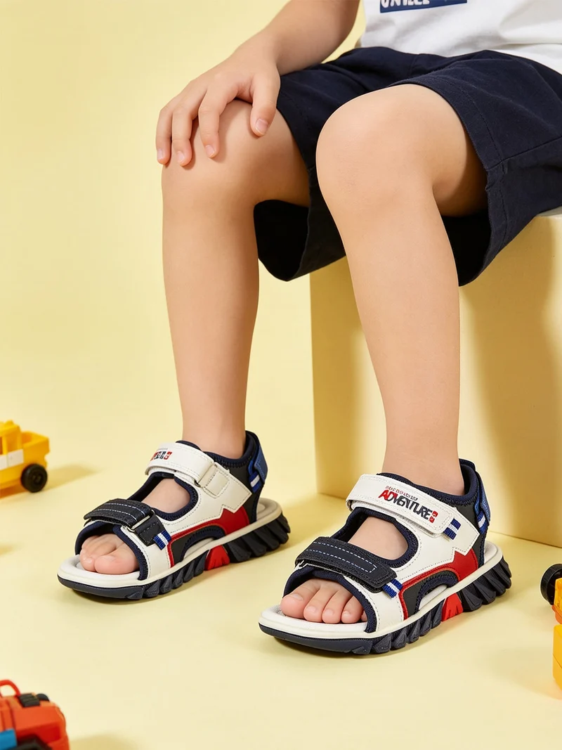 Sandali da ragazzo con strappi - blu