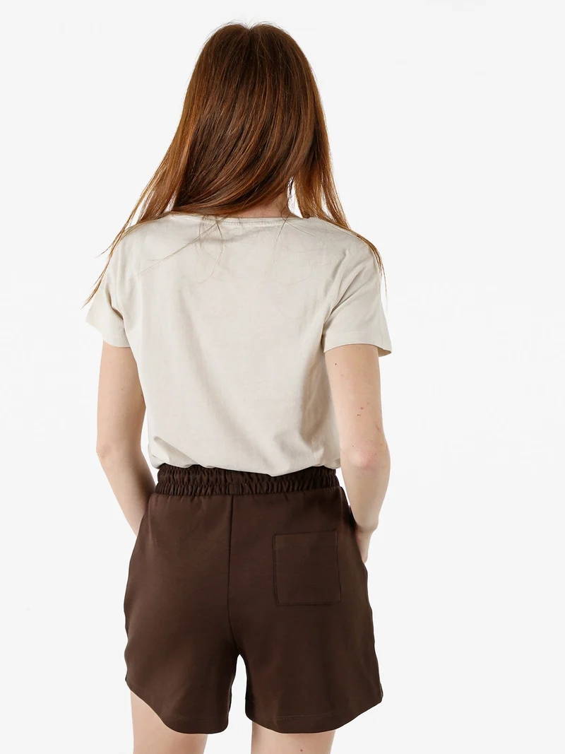 T-shirt donna in cotone con stampa animalier e micro borchie - sabbia