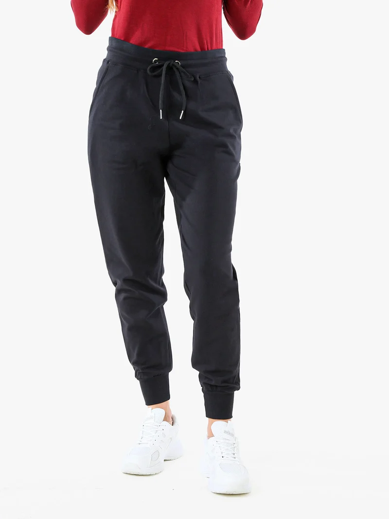 Pantaloni tuta da donna in cotone con coulisse e polsini - nero