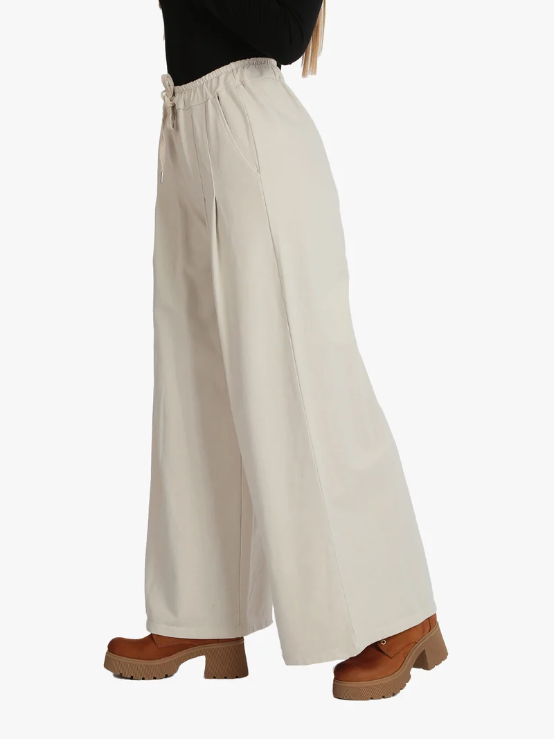 Pantaloni donna modello palazzo - beige