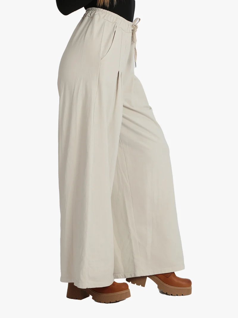 Pantaloni donna modello palazzo - beige