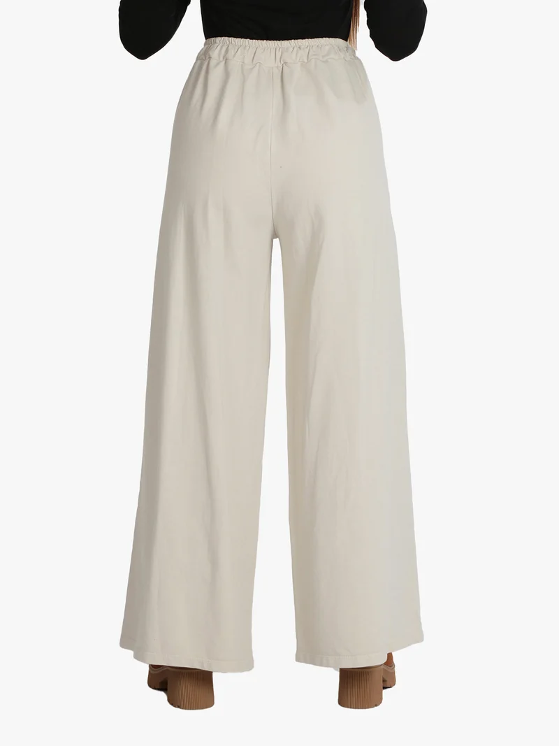 Pantaloni donna modello palazzo - beige