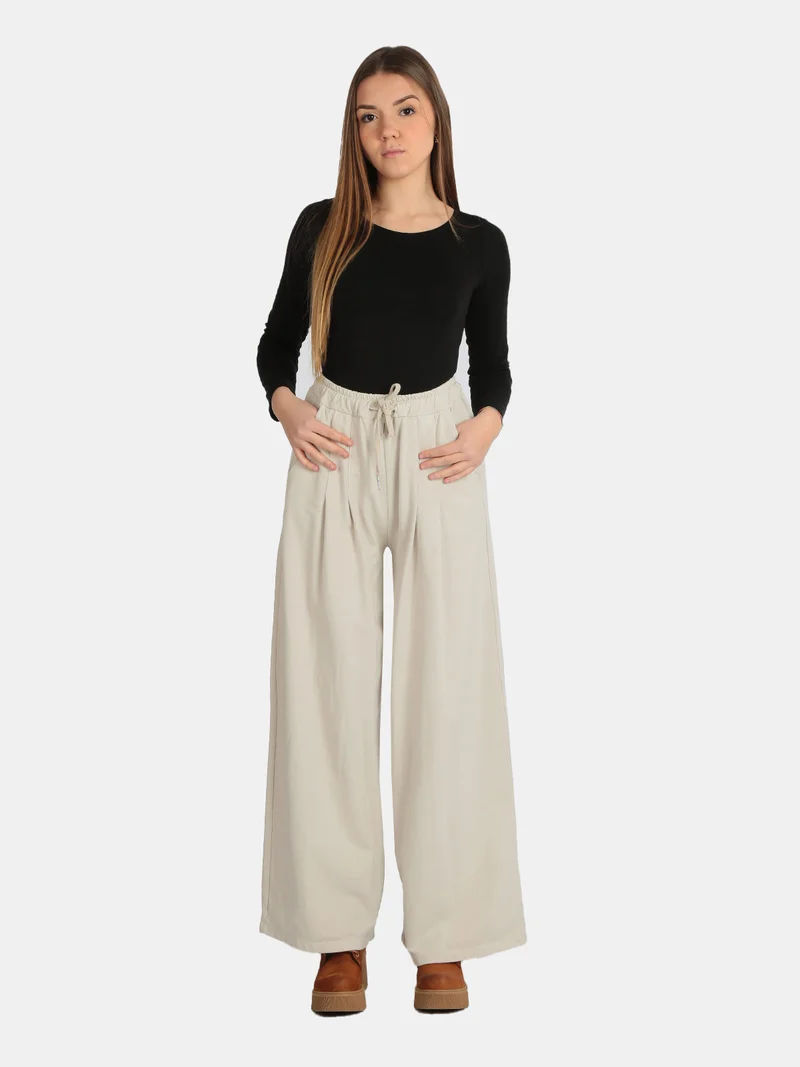Pantaloni donna modello palazzo - beige
