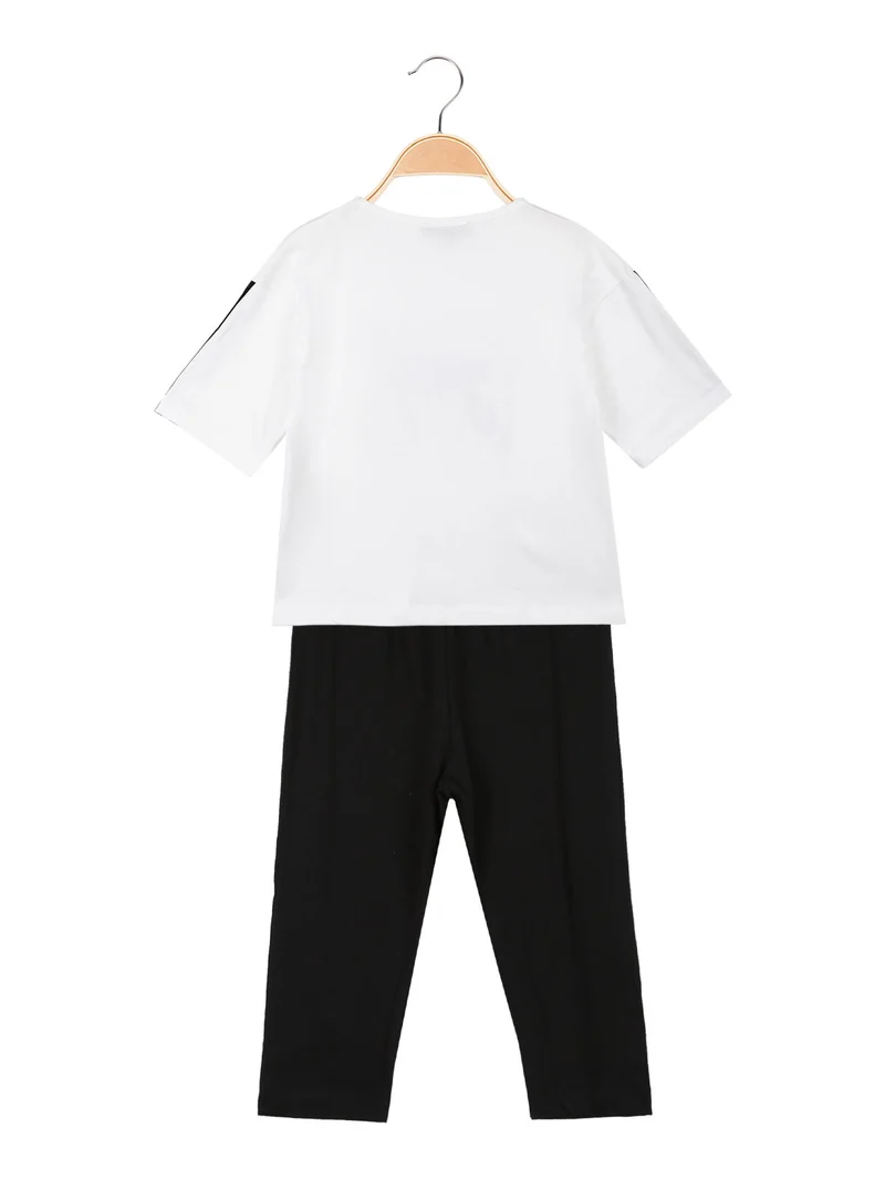 Completo corto da bambina con leggings 3/4 - bianco