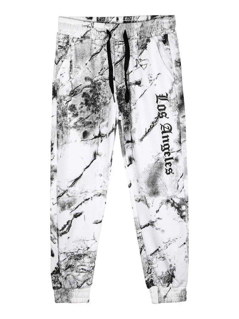 Pantaloni sportivi da bambino con coulisse e polsini - bianco