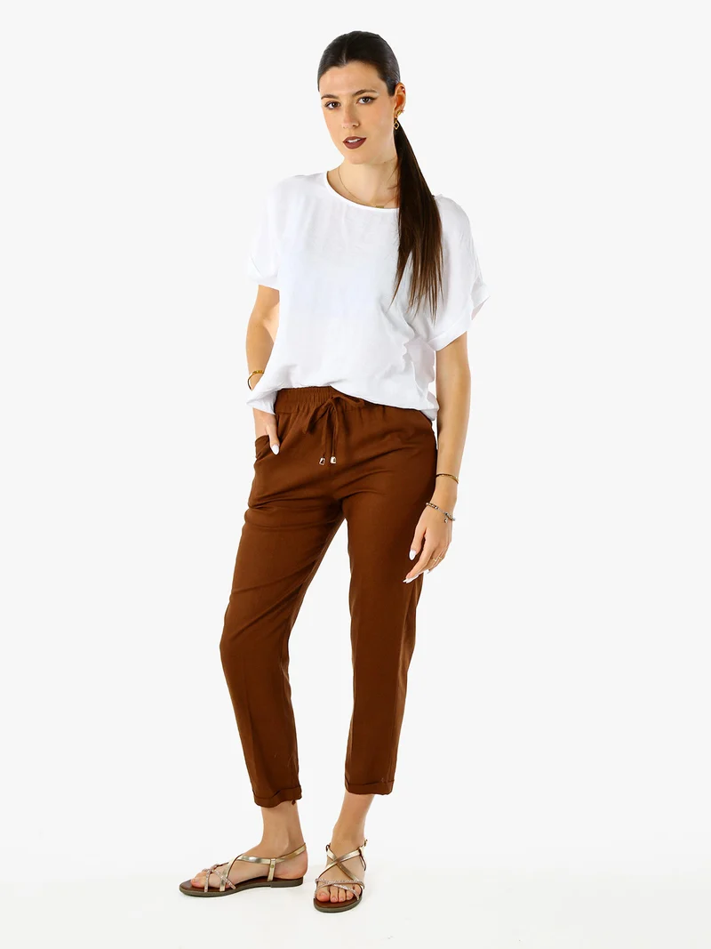 Blusa donna in viscosa a maniche corte con bottoni decorati sul retro - bianco