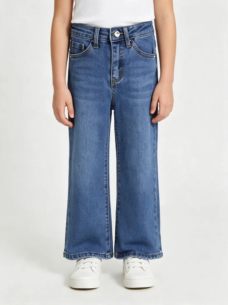 Jeans da bambina a gamba larga con strass sul retro - jeans