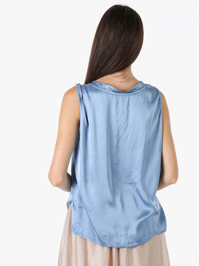 Top donna a spalla larga con scollo a V - blu