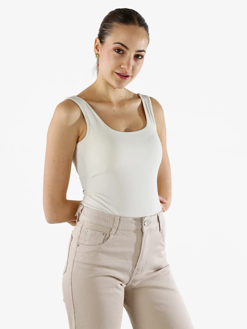 Top body donna senza maniche sgambato - panna