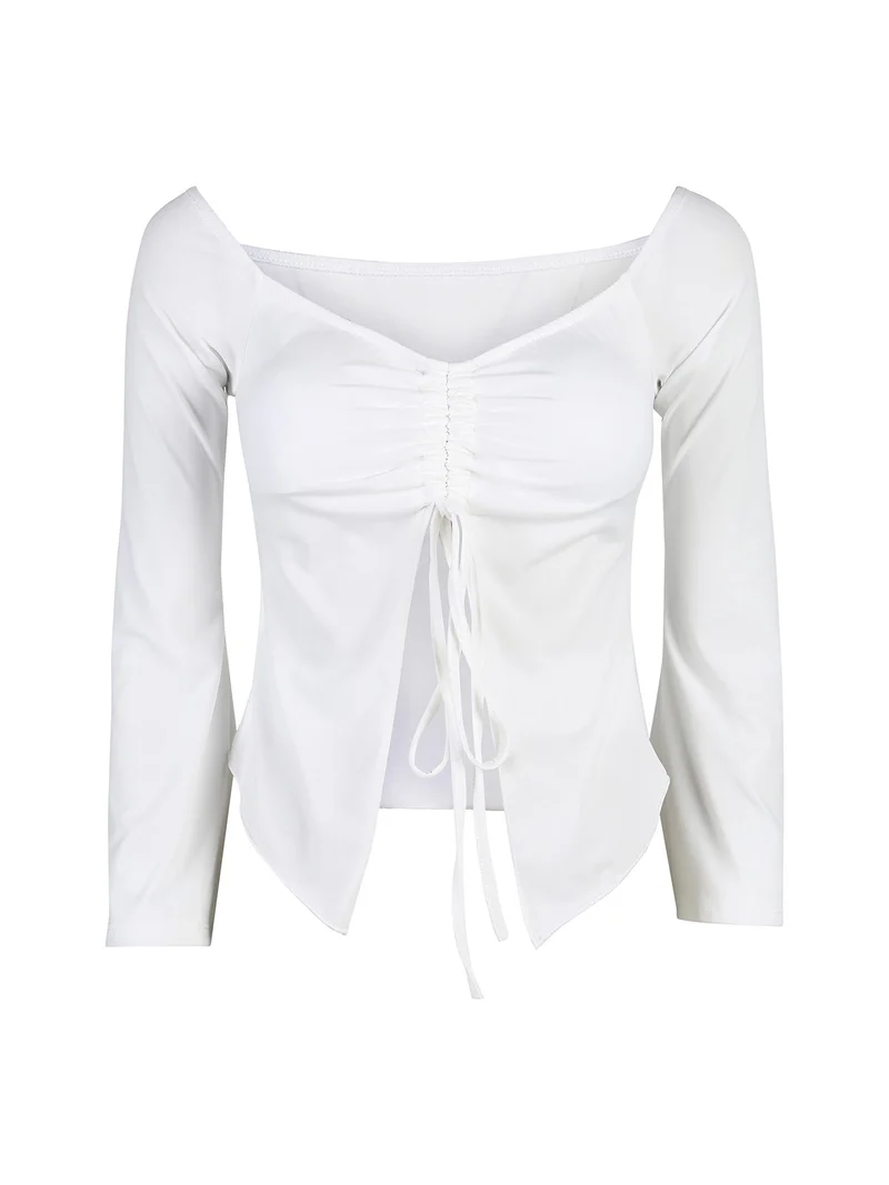 Top donna con maniche lunghe a campana e laccetti - bianco