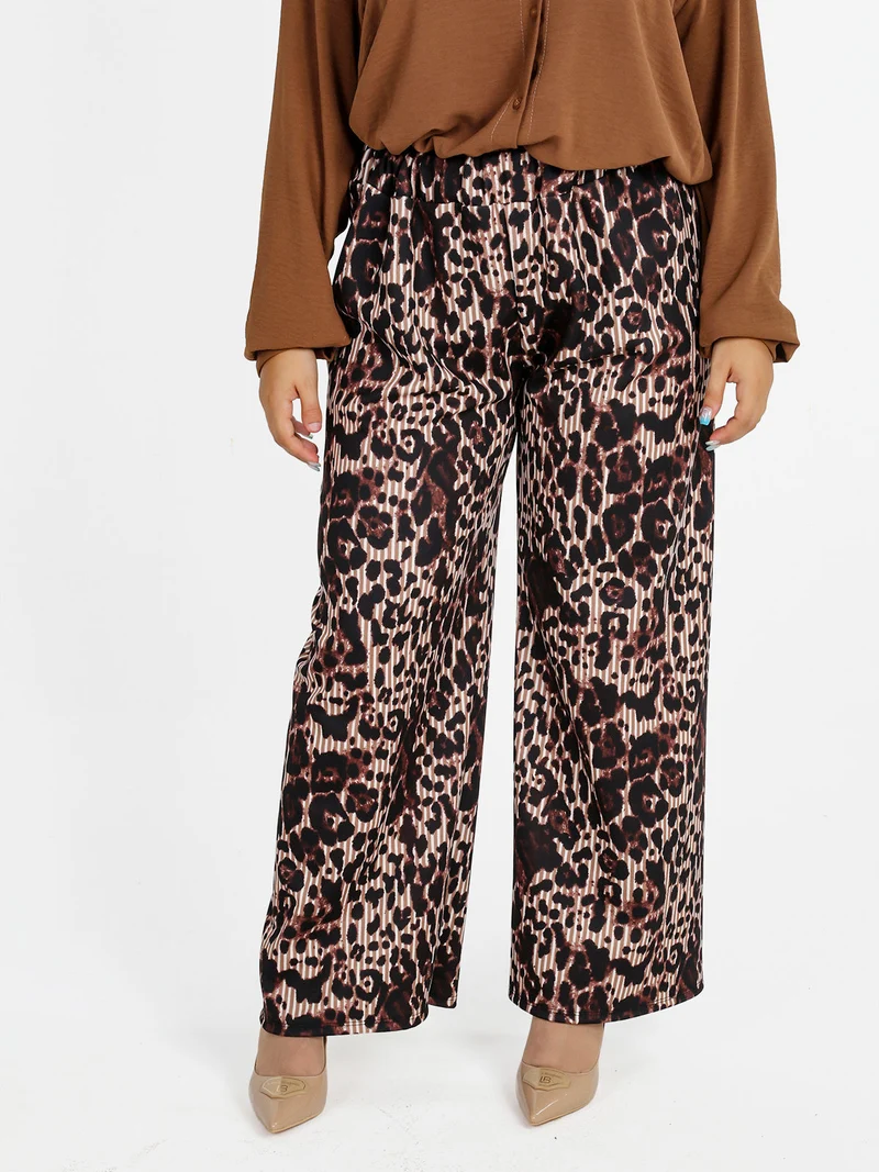 Pantaloni donna a gamba larga con stampa fantasia - moro