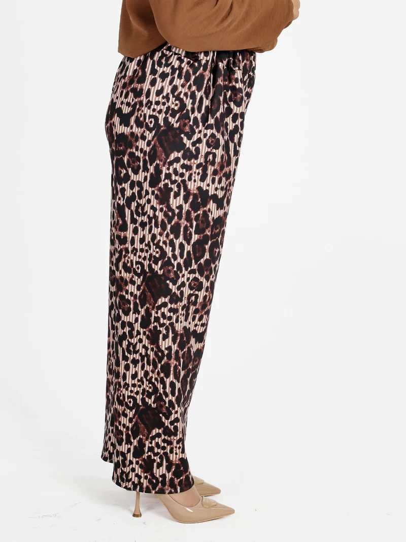 Pantaloni donna a gamba larga con stampa fantasia - moro