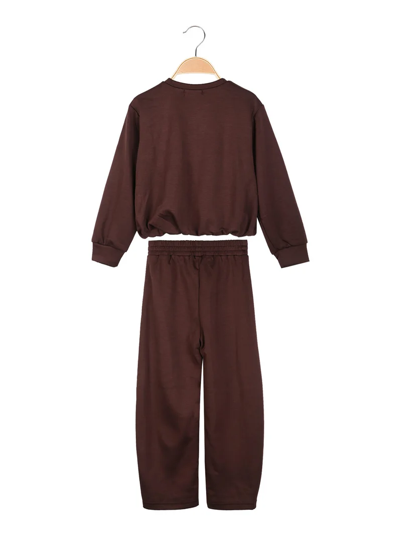 Completo 2 pezzi da bambina con felpa e pantaloni balloon - moro