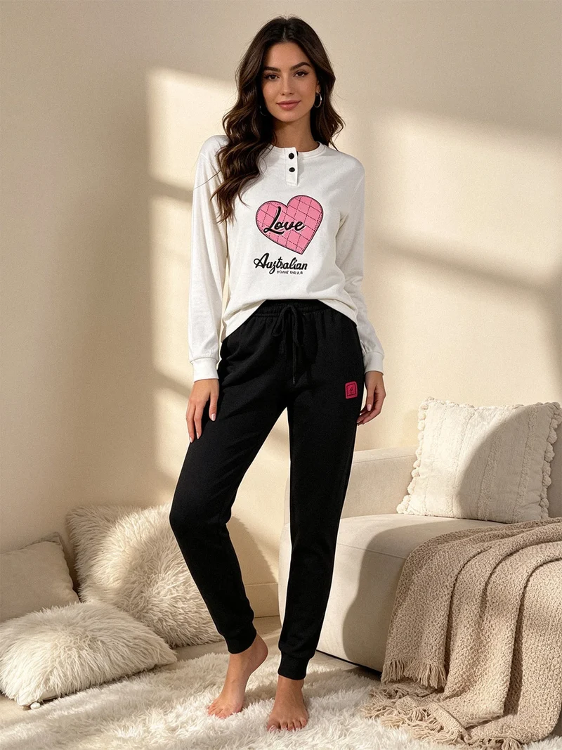 Pigiama lungo da donna in cotone interlock - panna