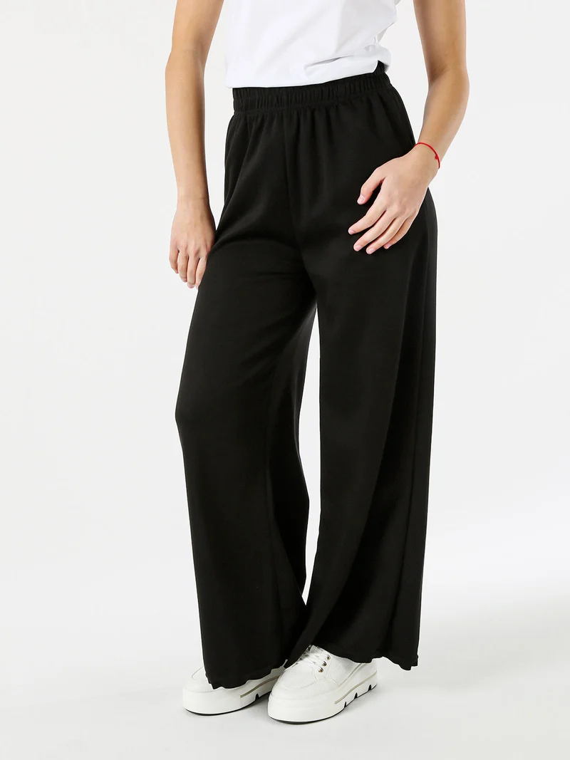 Pantaloni donna a palazzo in felpa - nero
