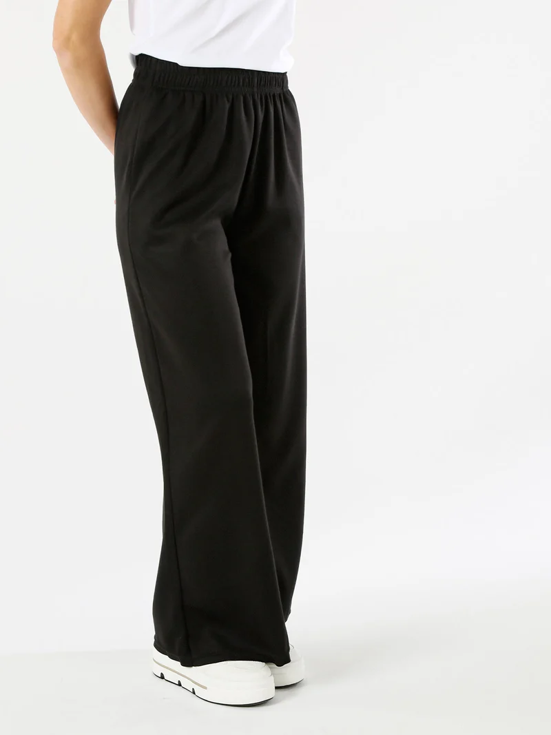 Pantaloni donna a palazzo in felpa - nero