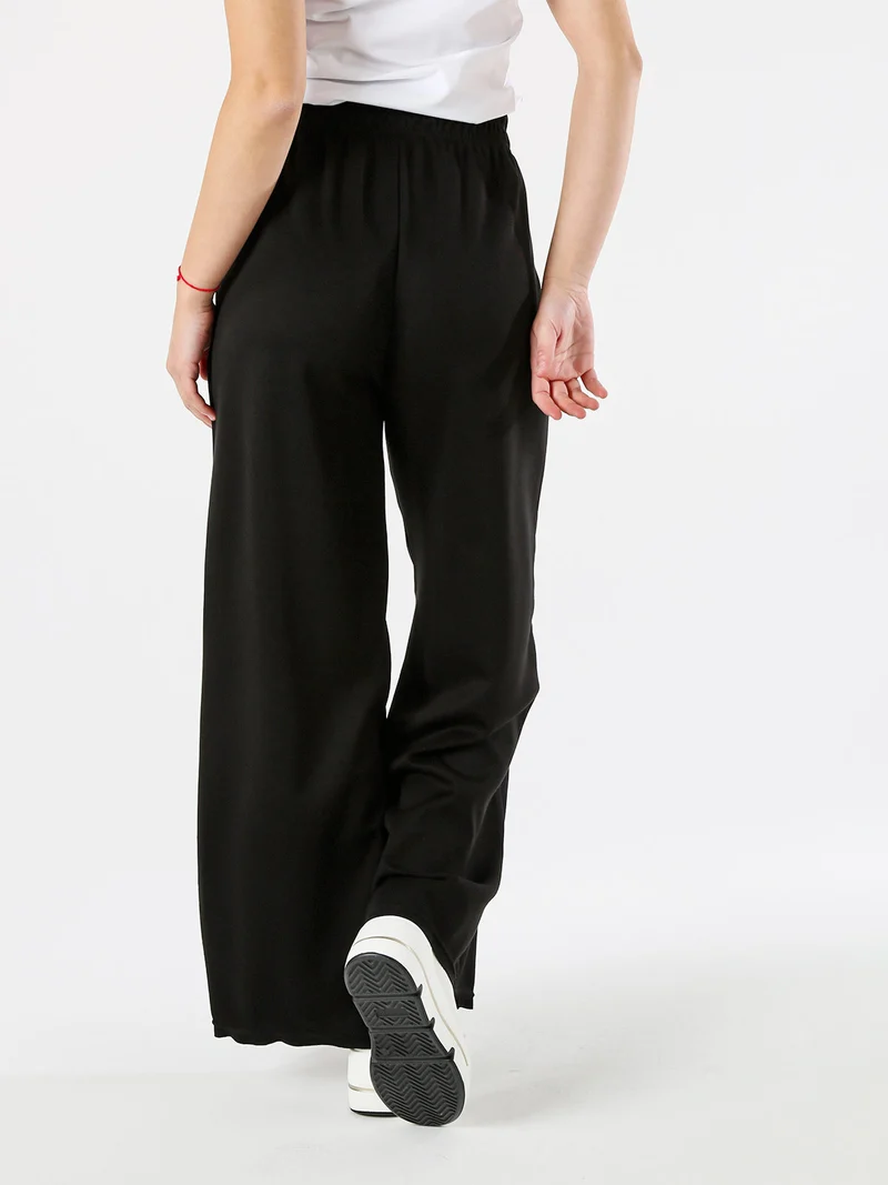 Pantaloni donna a palazzo in felpa - nero