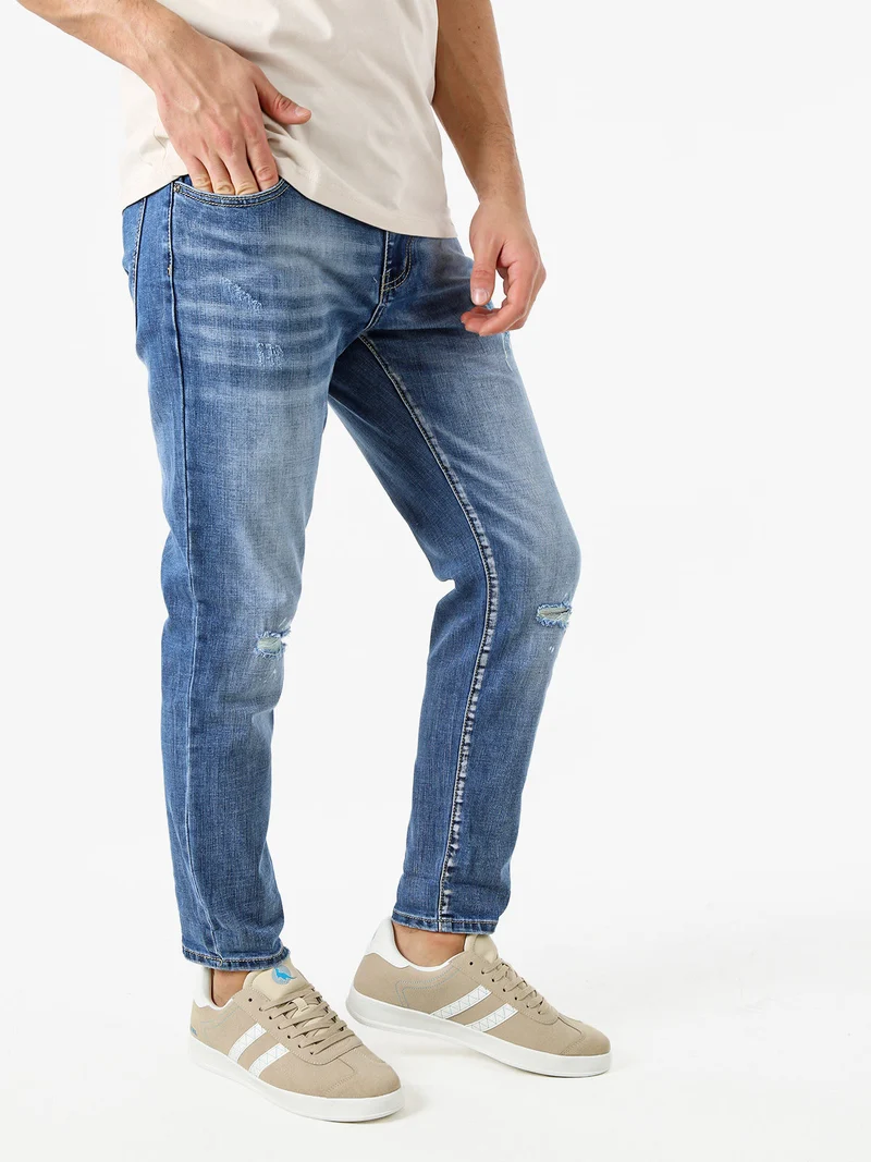 Jeans da uomo con strappi a vita bassa - jeans