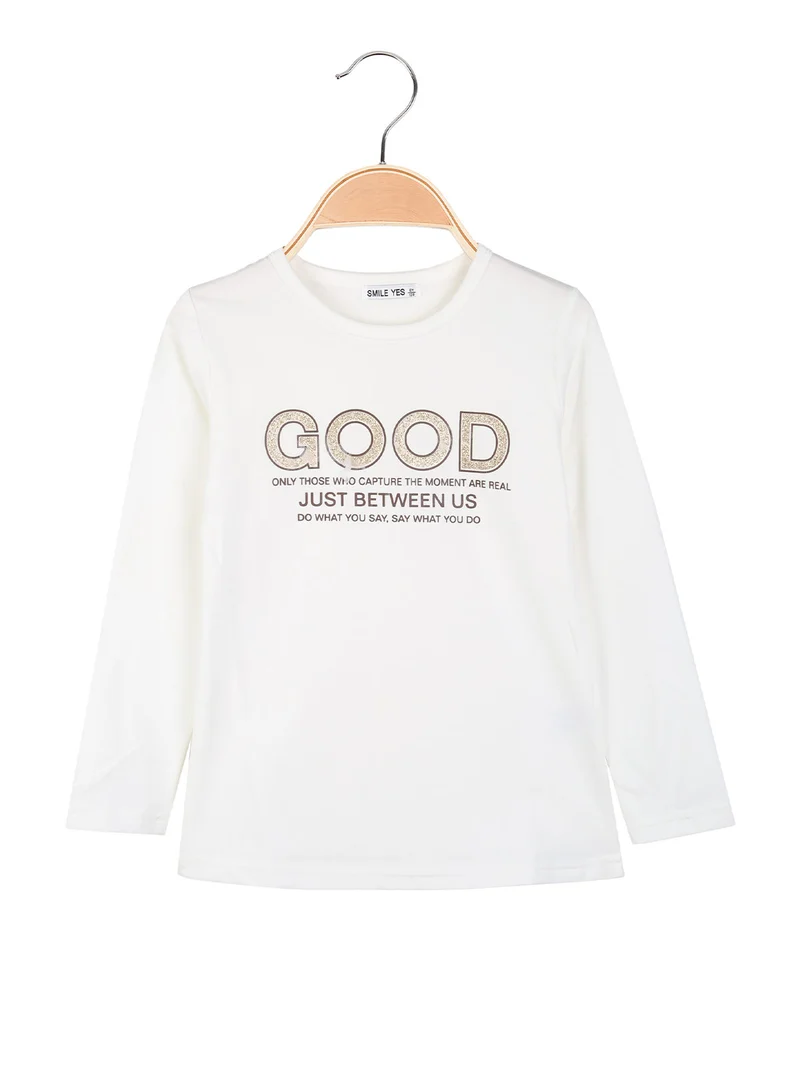 T-shirt da bambina a maniche lunghe con scritta glitter - bianco