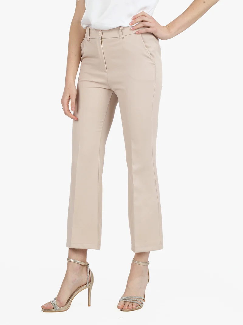 Pantaloni eleganti da donna con finale a zampa - beige