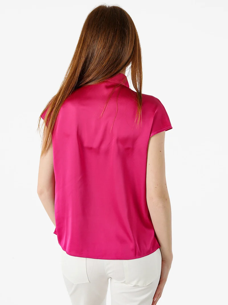 Blusa donna senza maniche con scollo a V profondo - fucsia