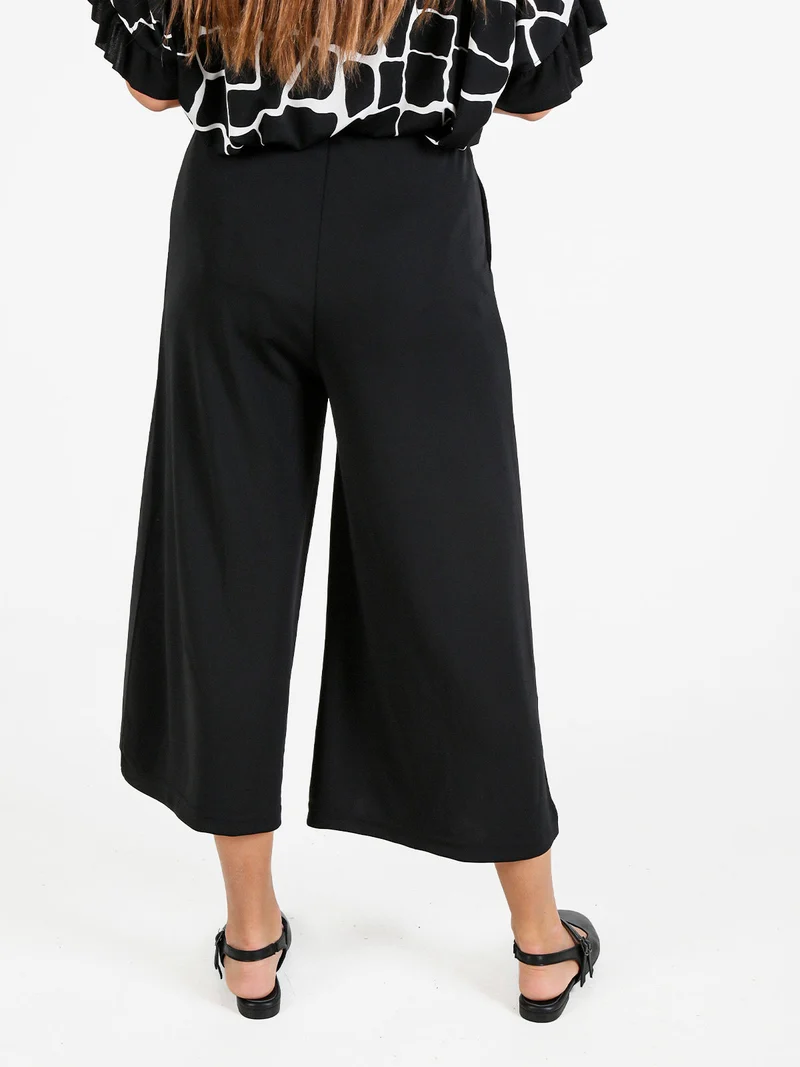 Pantaloni donna a gamba larga con spacco centrale - nero