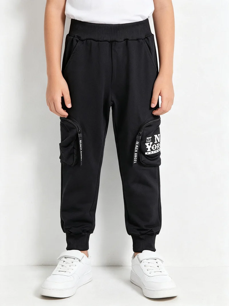 Pantaloni da bambino cargo con polsini - blu scuro