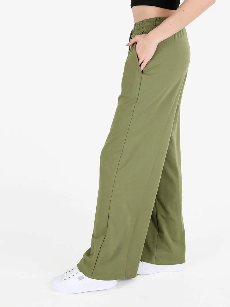 Pantaloni sportivi da donna a gamba larga con coulisse - verde