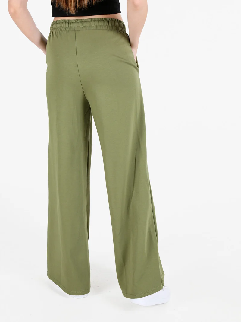 Pantaloni sportivi da donna a gamba larga con coulisse - verde