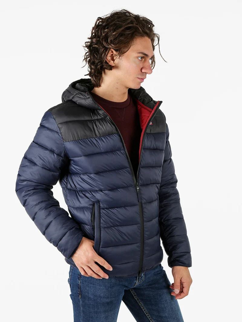 Giubbotto imbottito da uomo con cappuccio e zip - blu scuro
