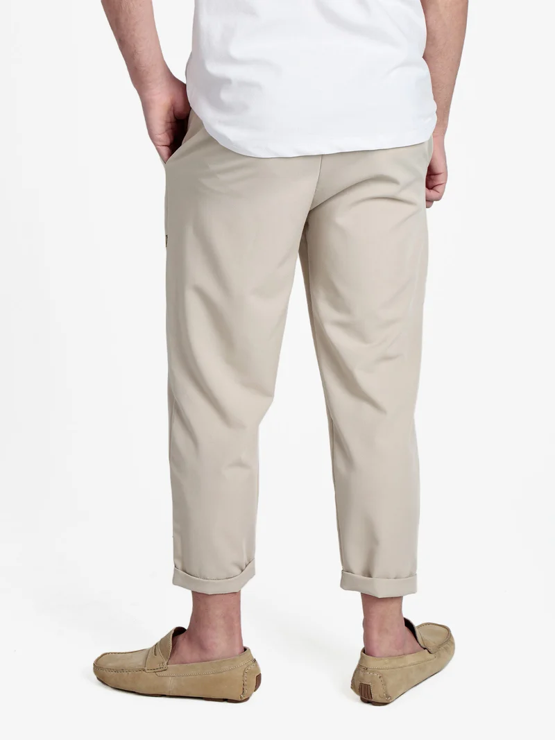 Pantaloni casual da uomo con coulisse e risvolto finale - sabbia