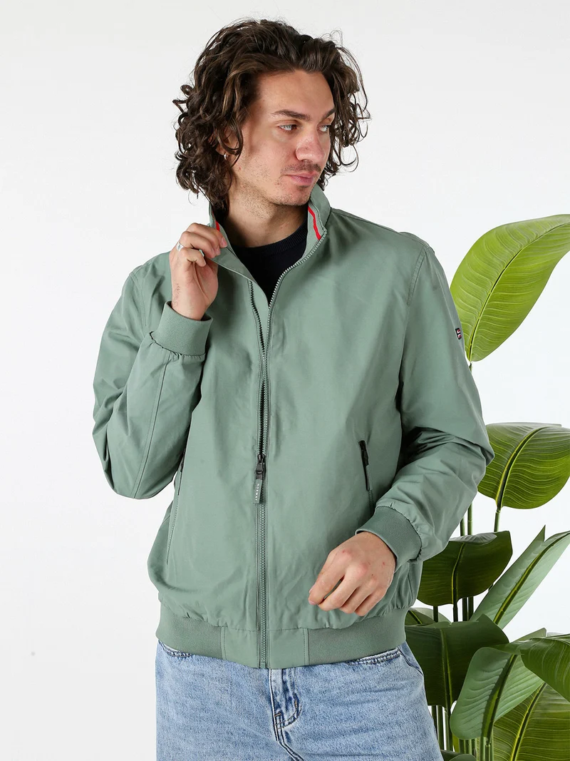 Giacca a vento da uomo con zip - pistacchio