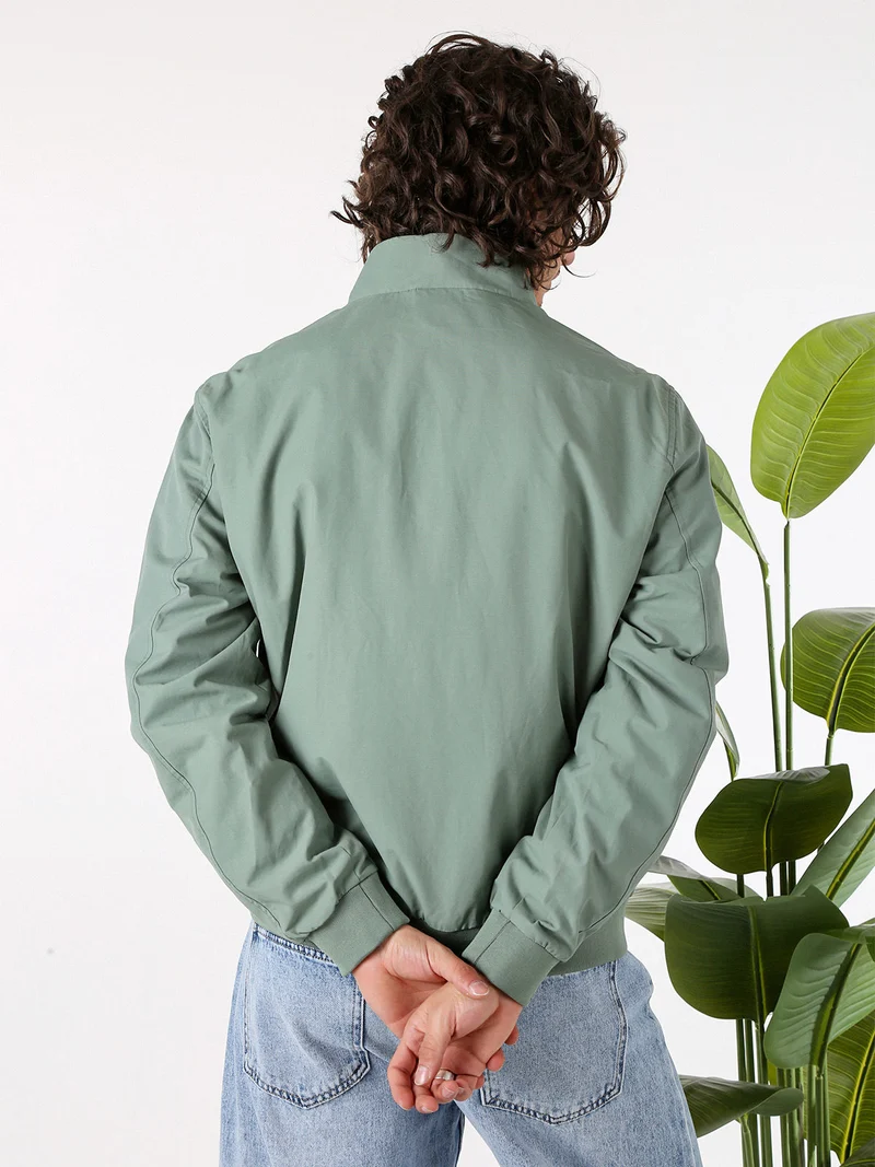 Giacca a vento da uomo con zip - pistacchio