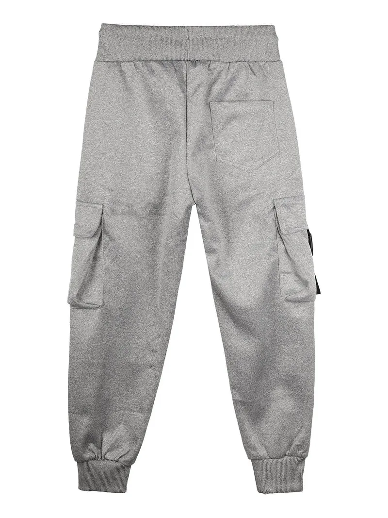 Pantaloni tuta da bambino con tasconi laterali e polsini - grigio