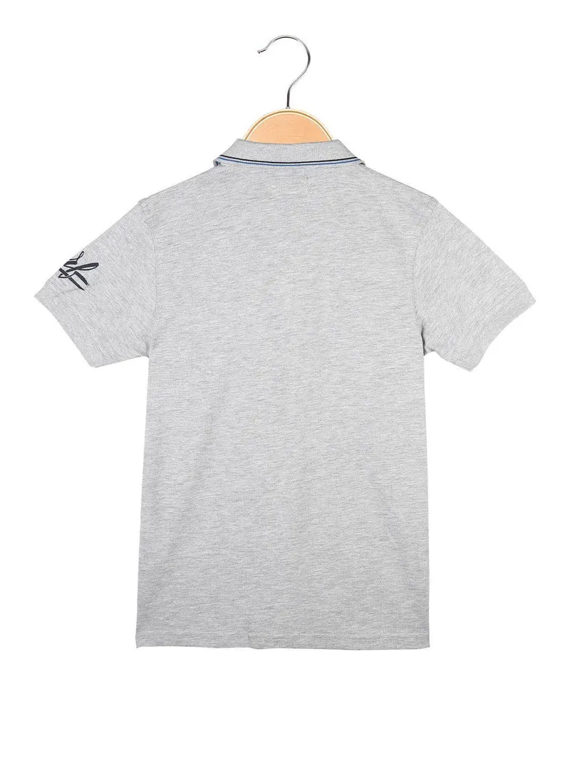 Polo da bambino a manica corta con scritta - grigio