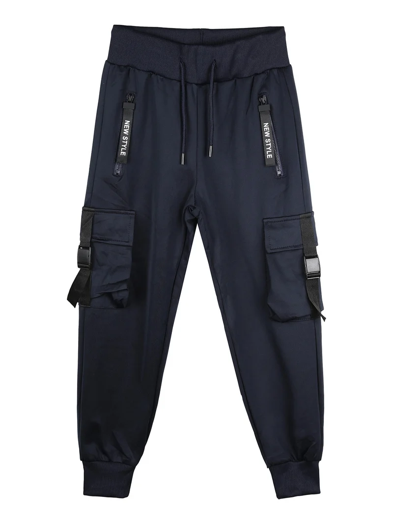 Pantaloni tuta da bambino con tasconi laterali e polsini - blu scuro