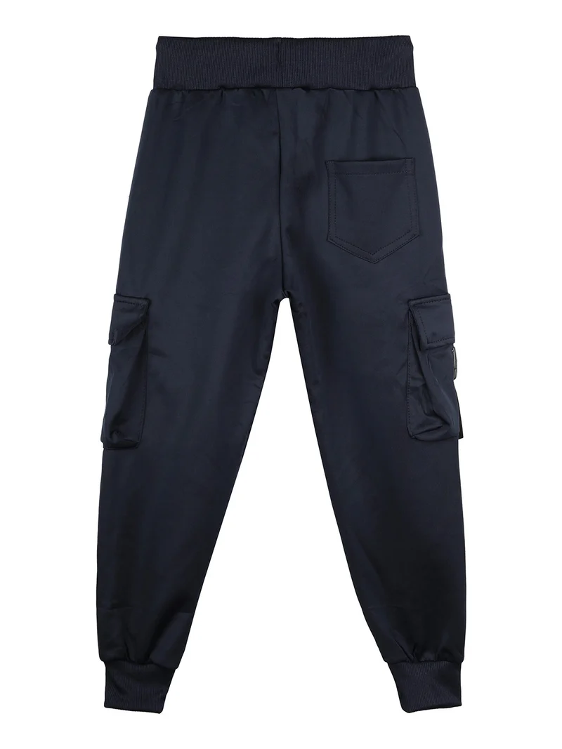 Pantaloni tuta da bambino con tasconi laterali e polsini - blu scuro