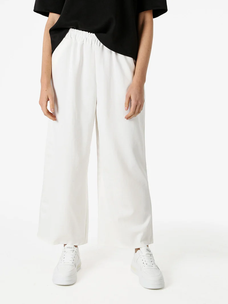 Pantaloni donna in felpa a gamba larga - bianco
