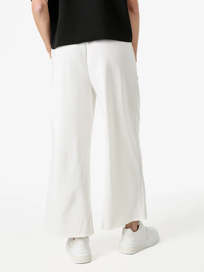 Pantaloni donna in felpa a gamba larga - bianco