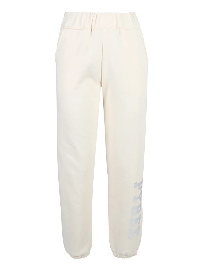 Pantaloni tuta da donna felpati con elastico finale - panna