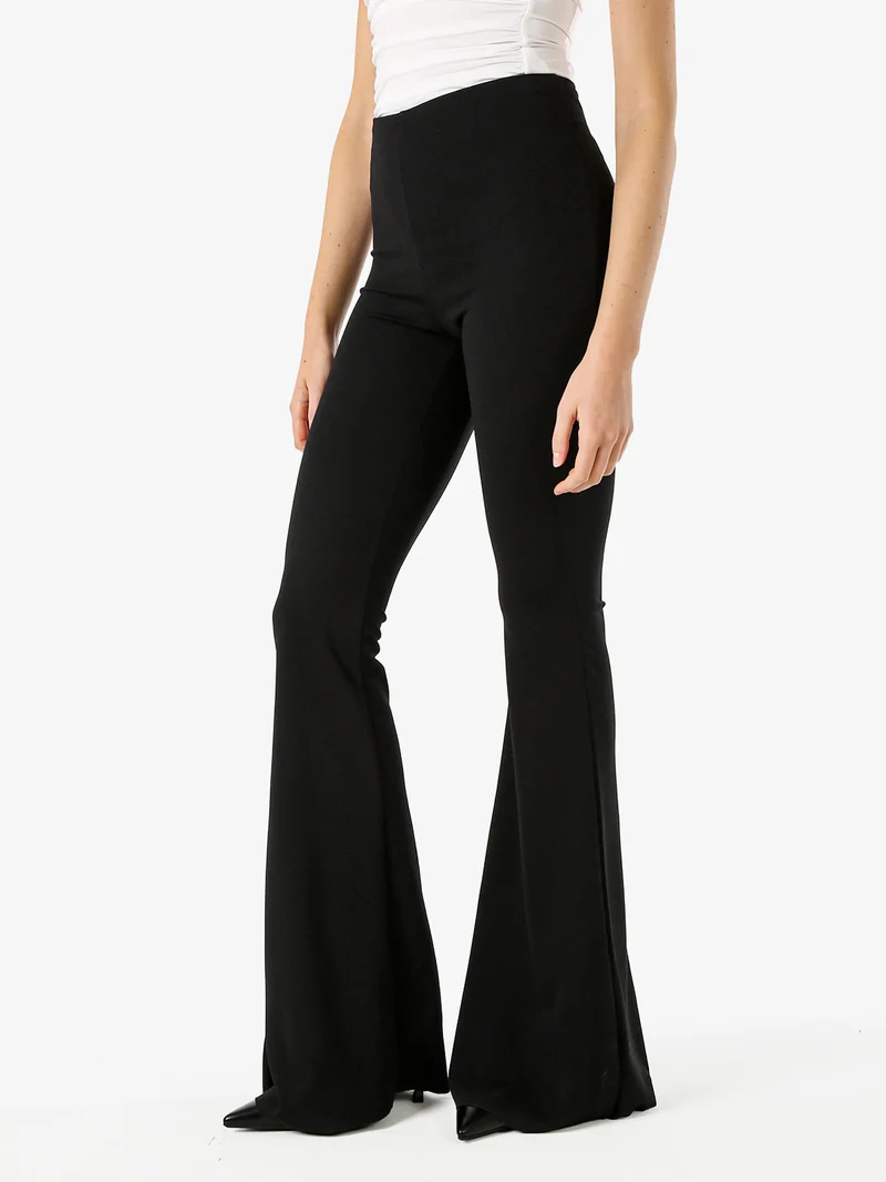 Pantaloni eleganti da donna con finale a zampa - nero
