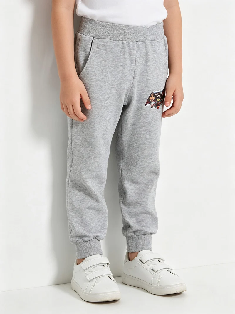 Pantaloni sportivi bambino con polsino - grigio