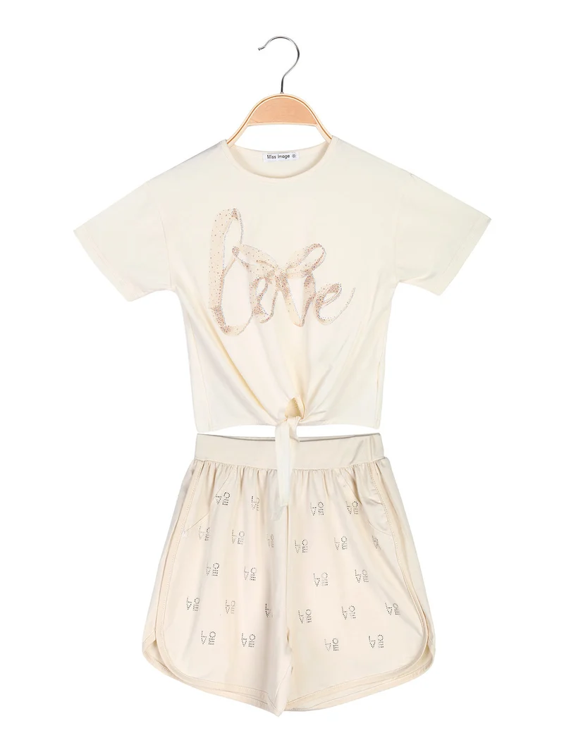 Completo corto da bambina in cotone con t-shirt e shorts - beige