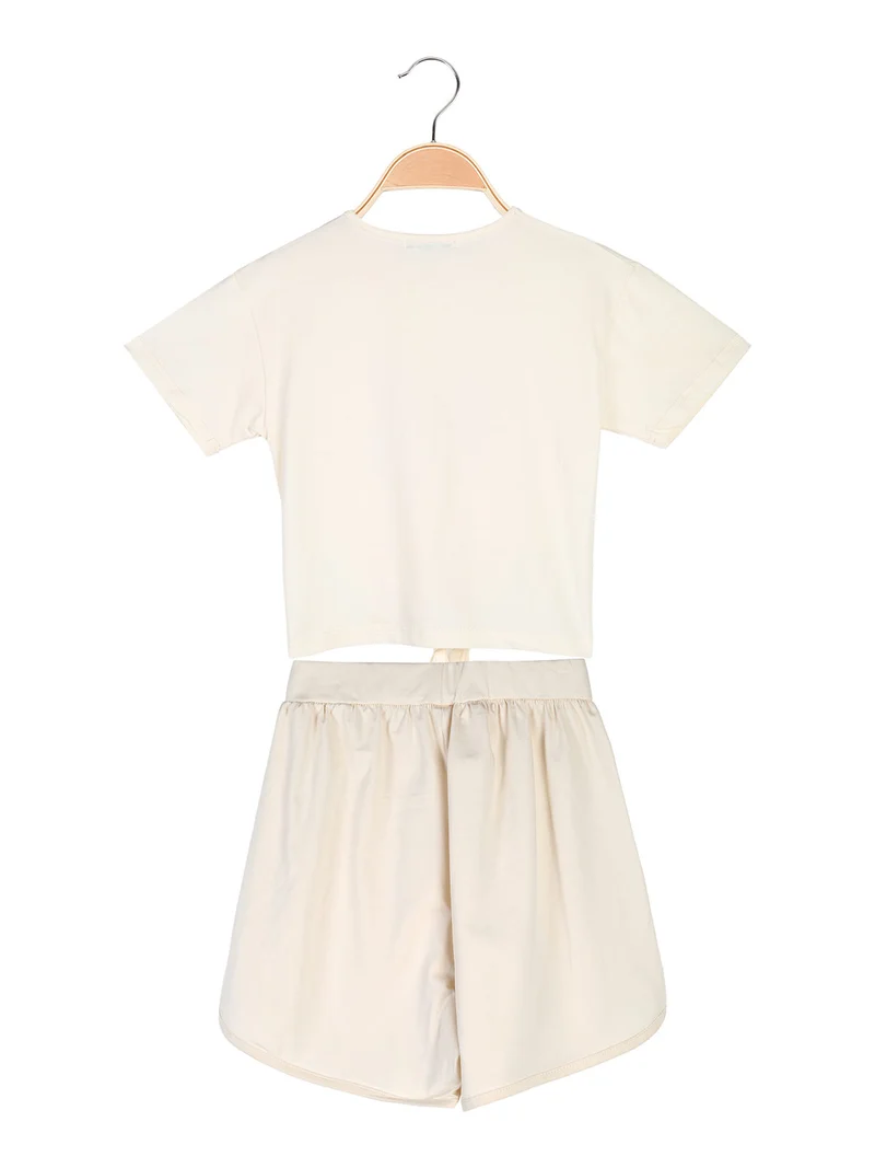 Completo corto da bambina in cotone con t-shirt e shorts - beige