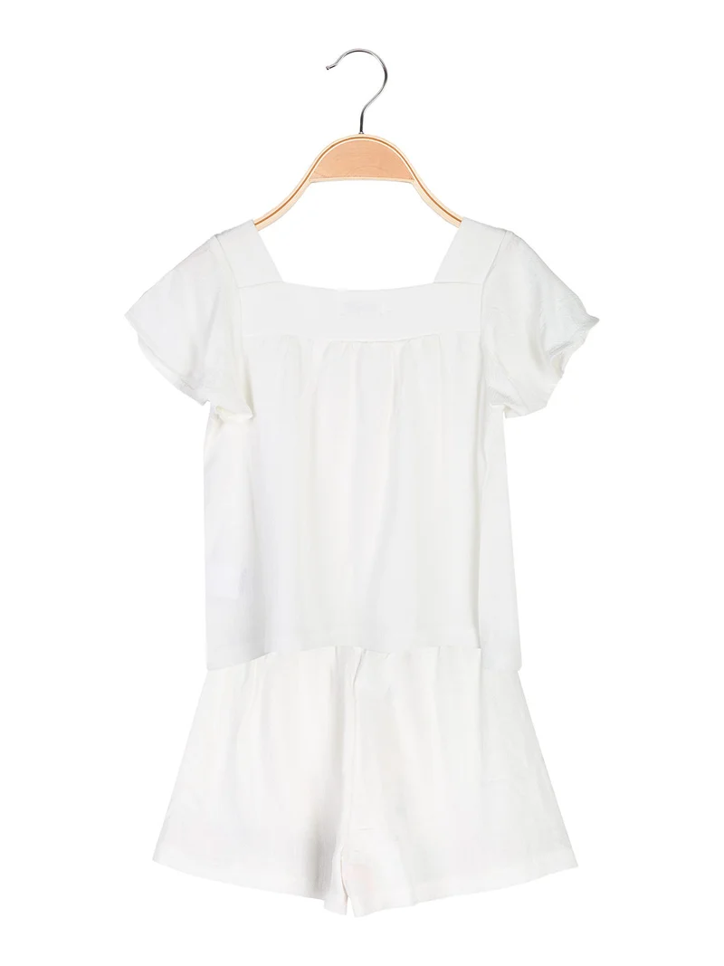 Completo corto da bambina in misto cotone e lino con t-shirt e shorts ricamati - bianco