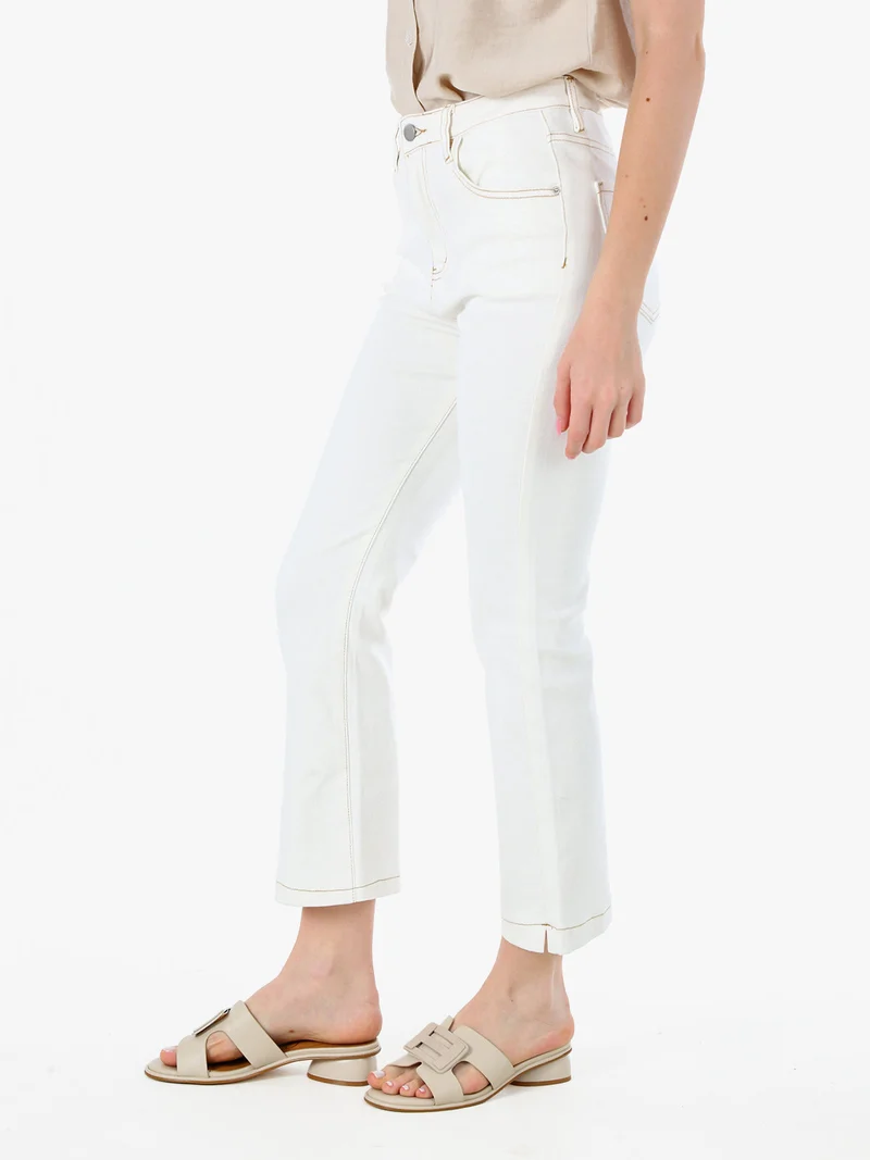 Pantaloni donna jeans cropped a zampa - panna