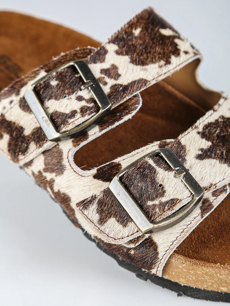 Ciabatte donna in pelle animalier con doppia fibbia - bianco